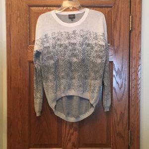 Long sleeved sweater.